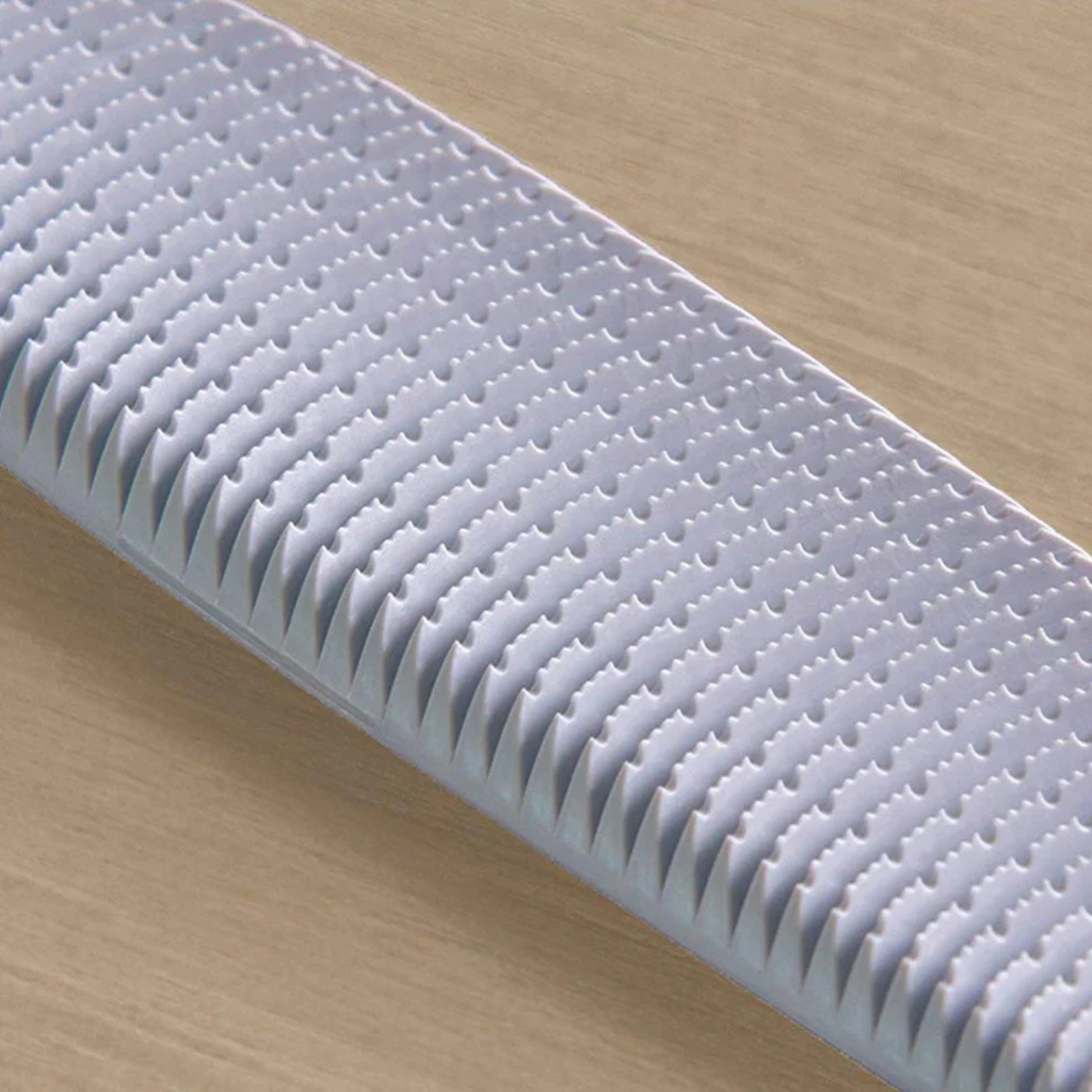 Lick-Like Cat Tongue Massage Brush — tongue-inspired grooming brush that mimics a cat’s tongue texture for gentle bonding and relaxation